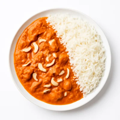 Butter Chicken (mit Basmatireis serviert)