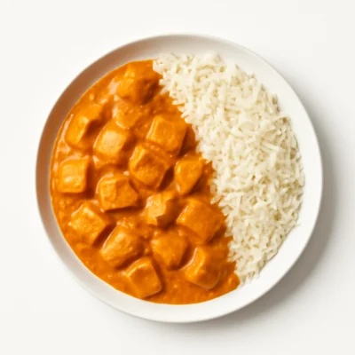 Chicken Curry (Mild) (mit Basmatireis serviert)
