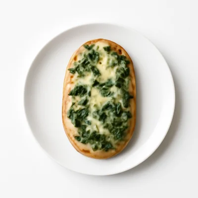 Brot mit Spinat & Käse überbacken